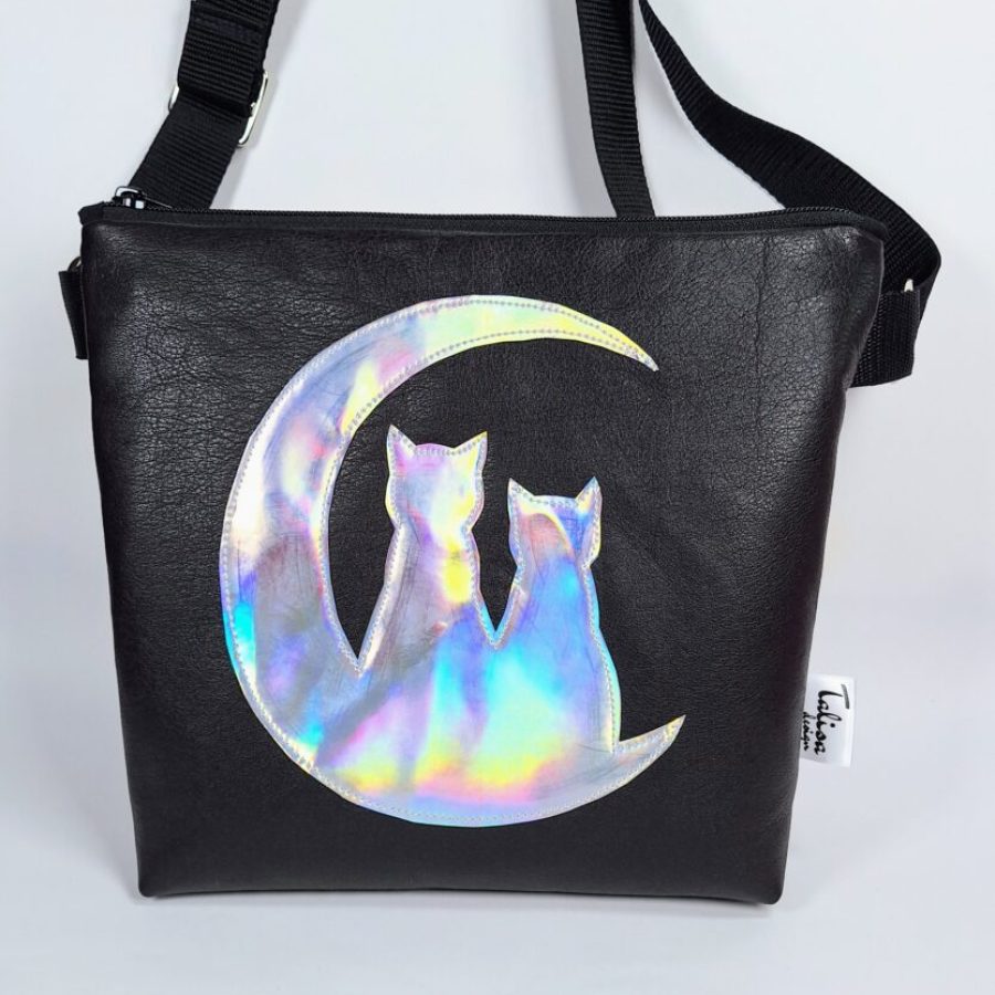 kuutamonahkalaukkumustahologrammi